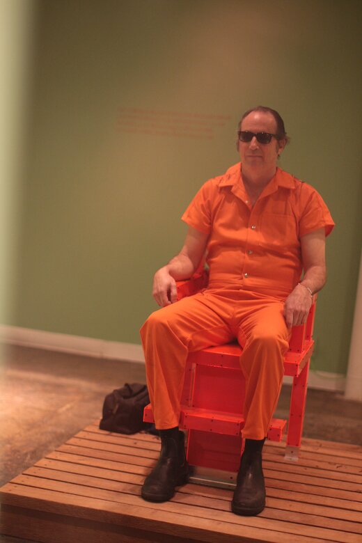 Hills Snyder seated in execution chair